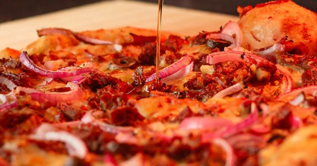 Savory meets Sweet: Caramelized Onion and Peach Pizza – A Flavor